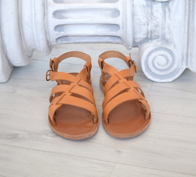 Ancient greek leather sandals in natural tan color, elegant gladiator sandals