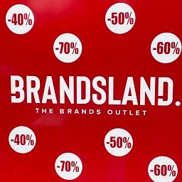 The logo of Brandsland, the Brands Outlet